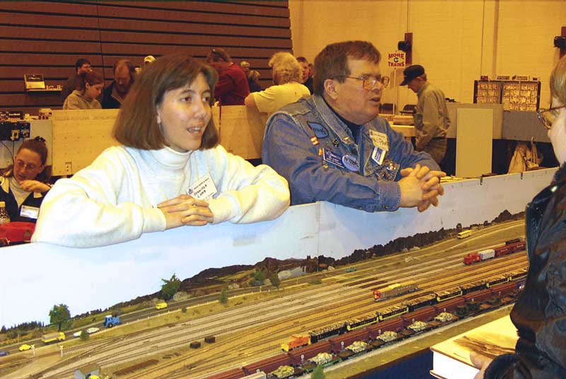 Jen and Bill talk to visitors