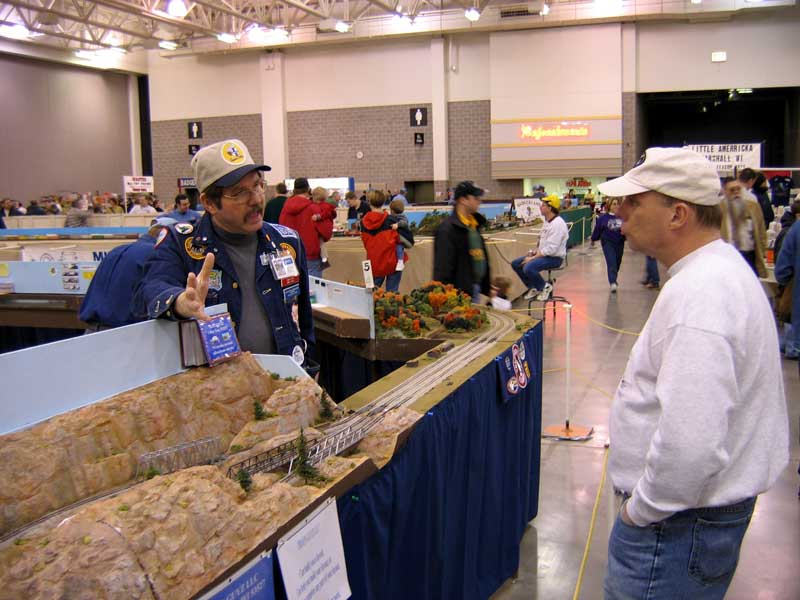 Mike talking trains with a visitor